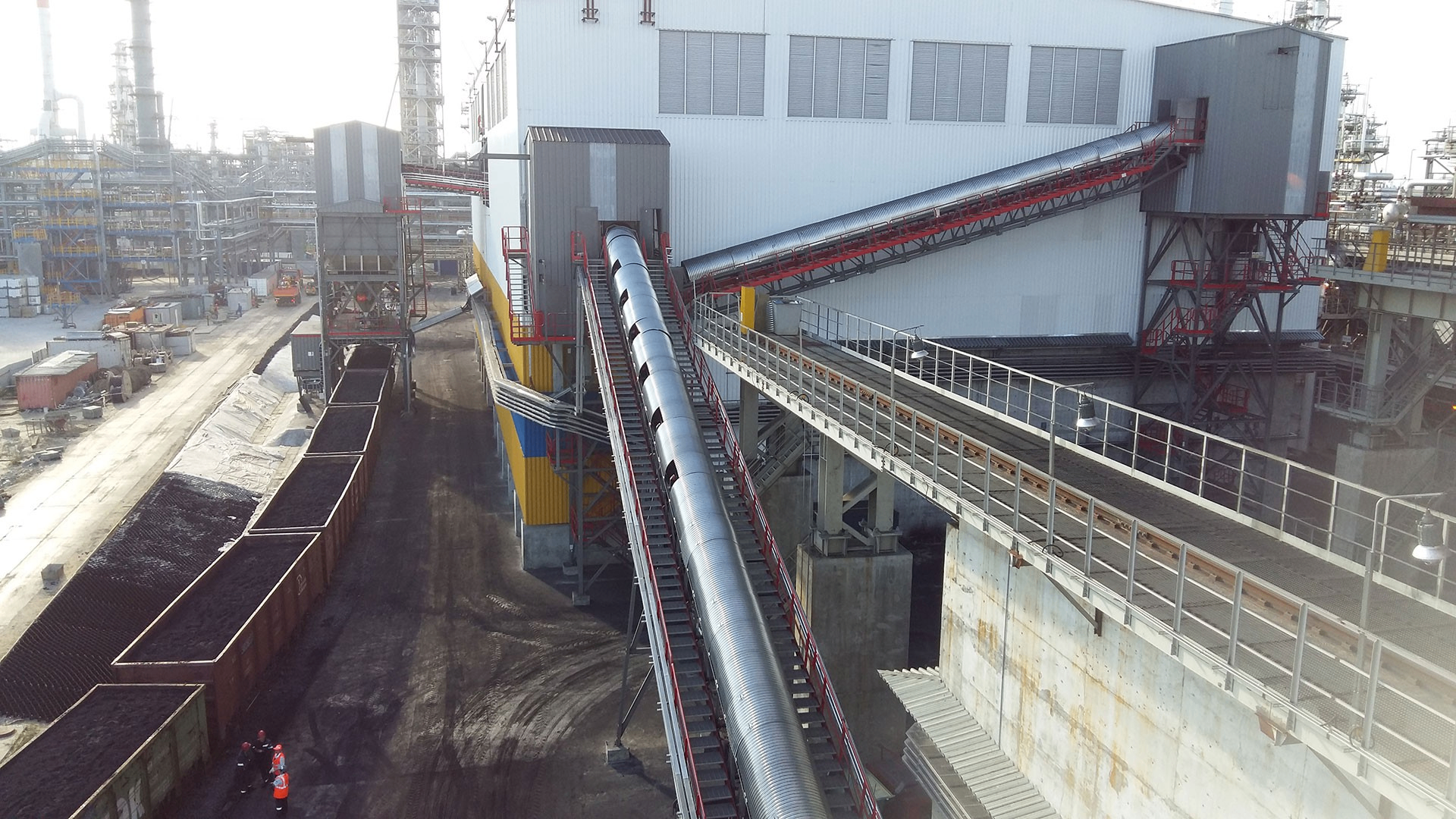 Enclosed conveyor gallery feeding the storage hall.