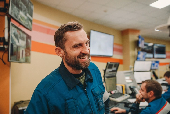 Control room operator smiling