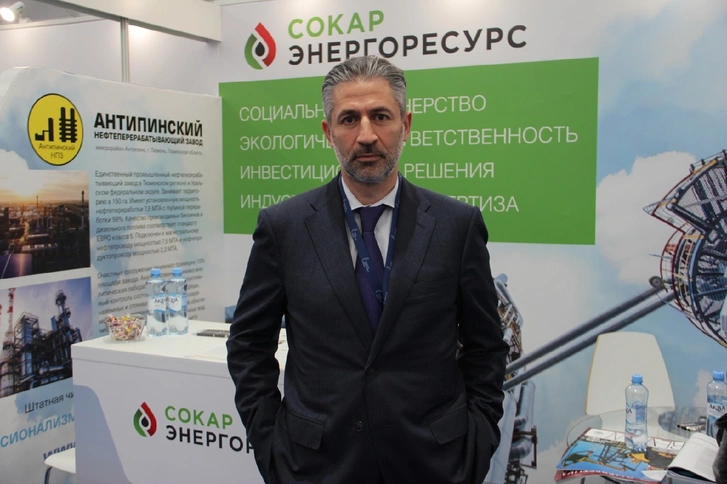 Executive at industry exhibition